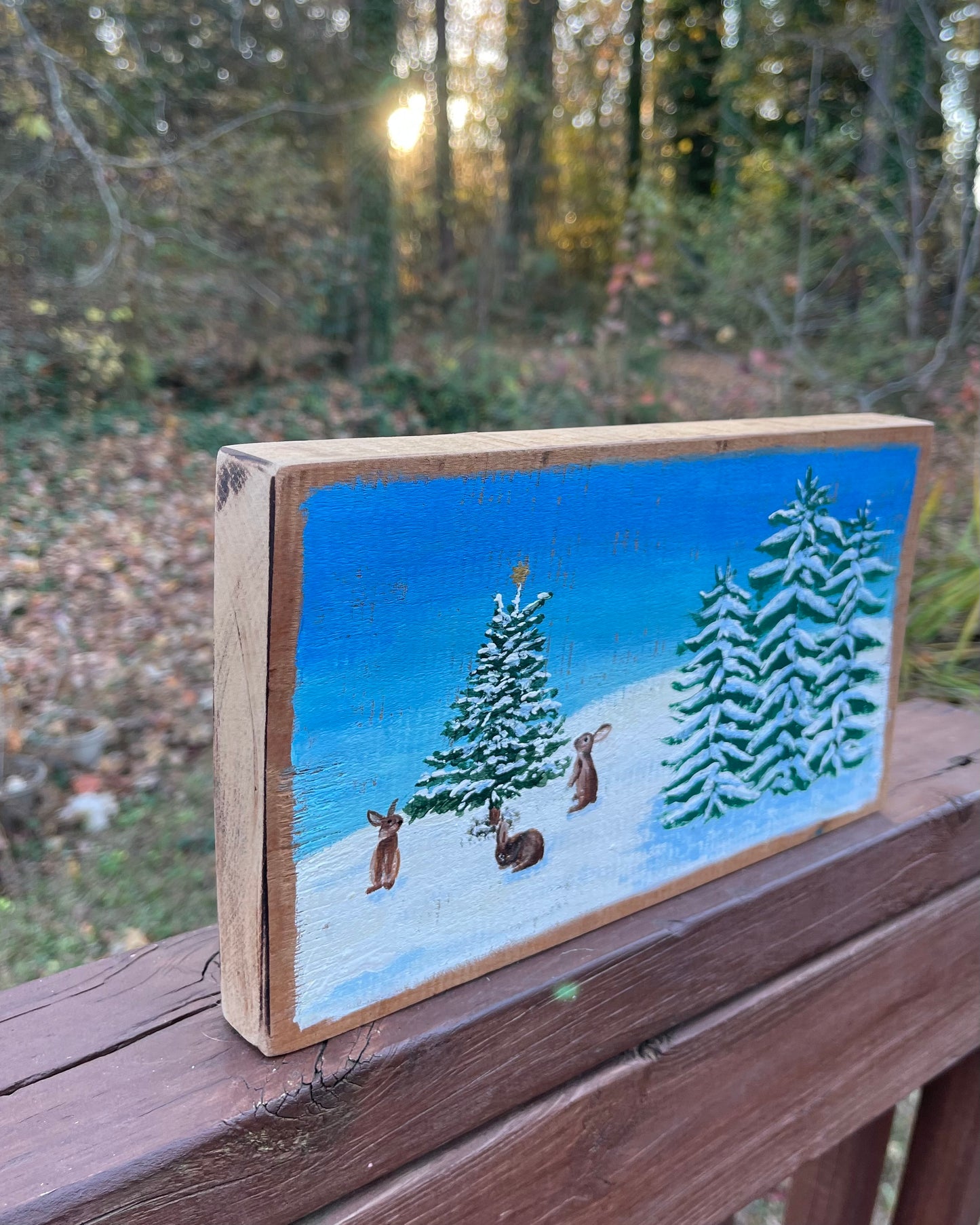 Bunnies and snowy evergreens