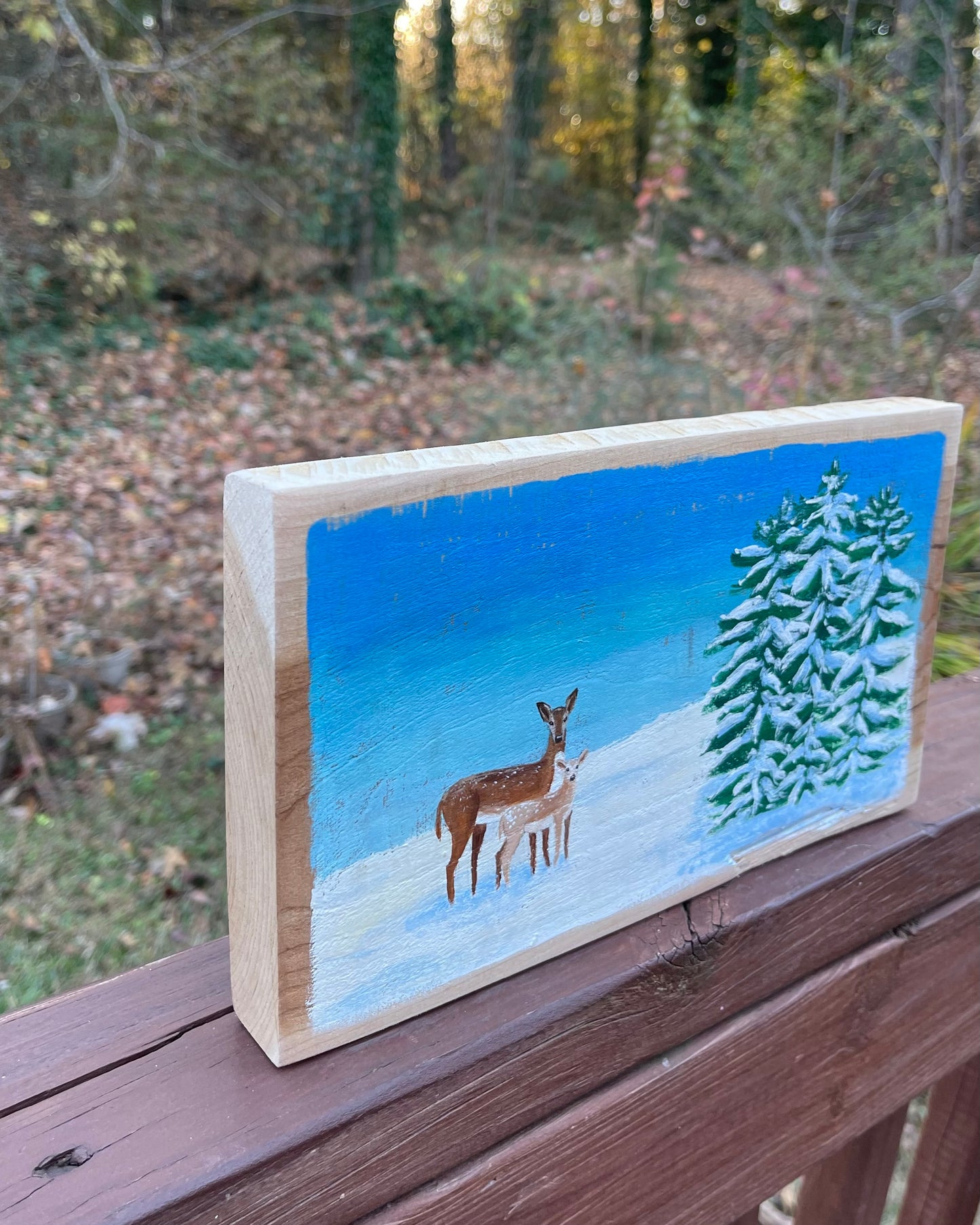 Deer and fawn in snow