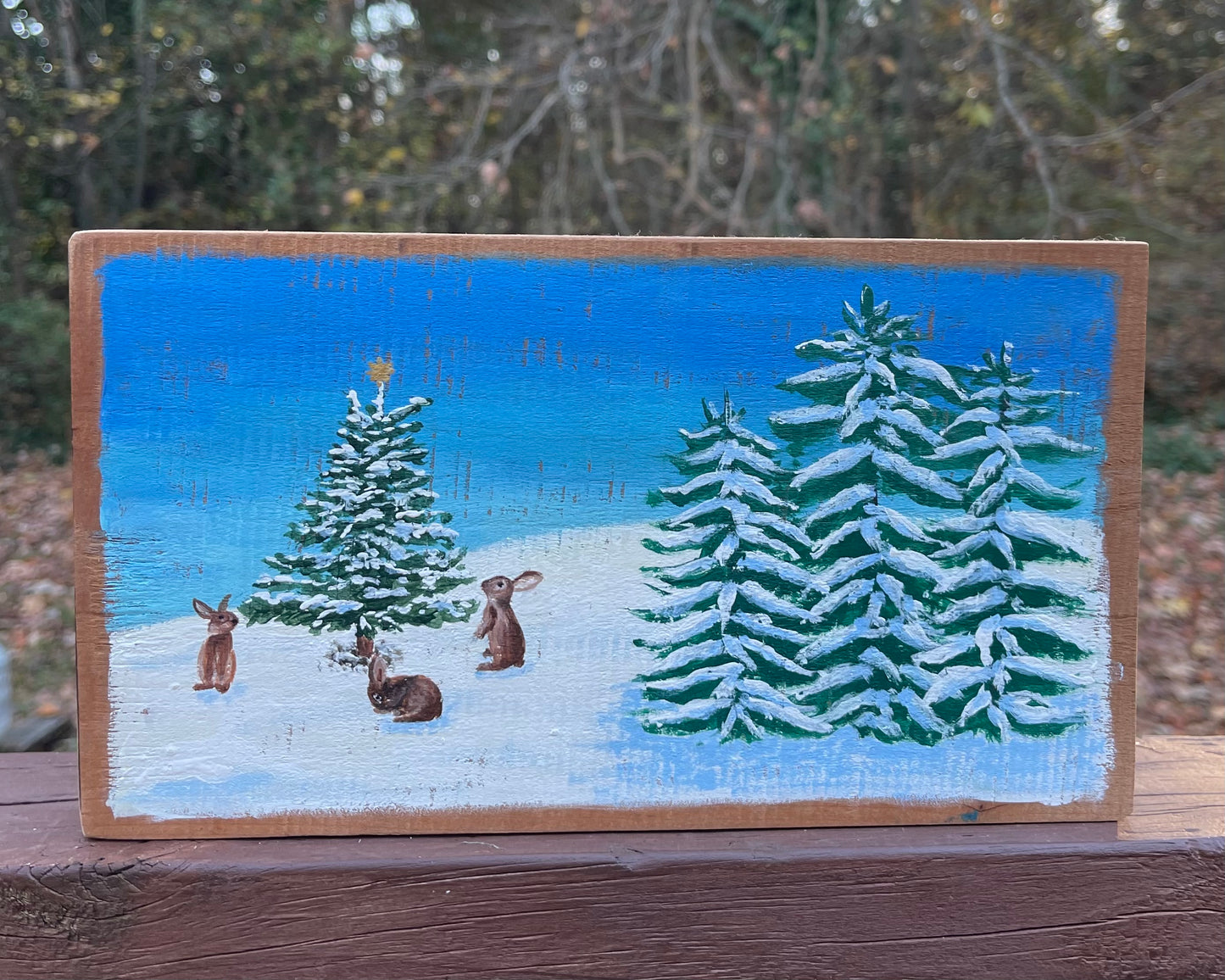Bunnies and snowy evergreens